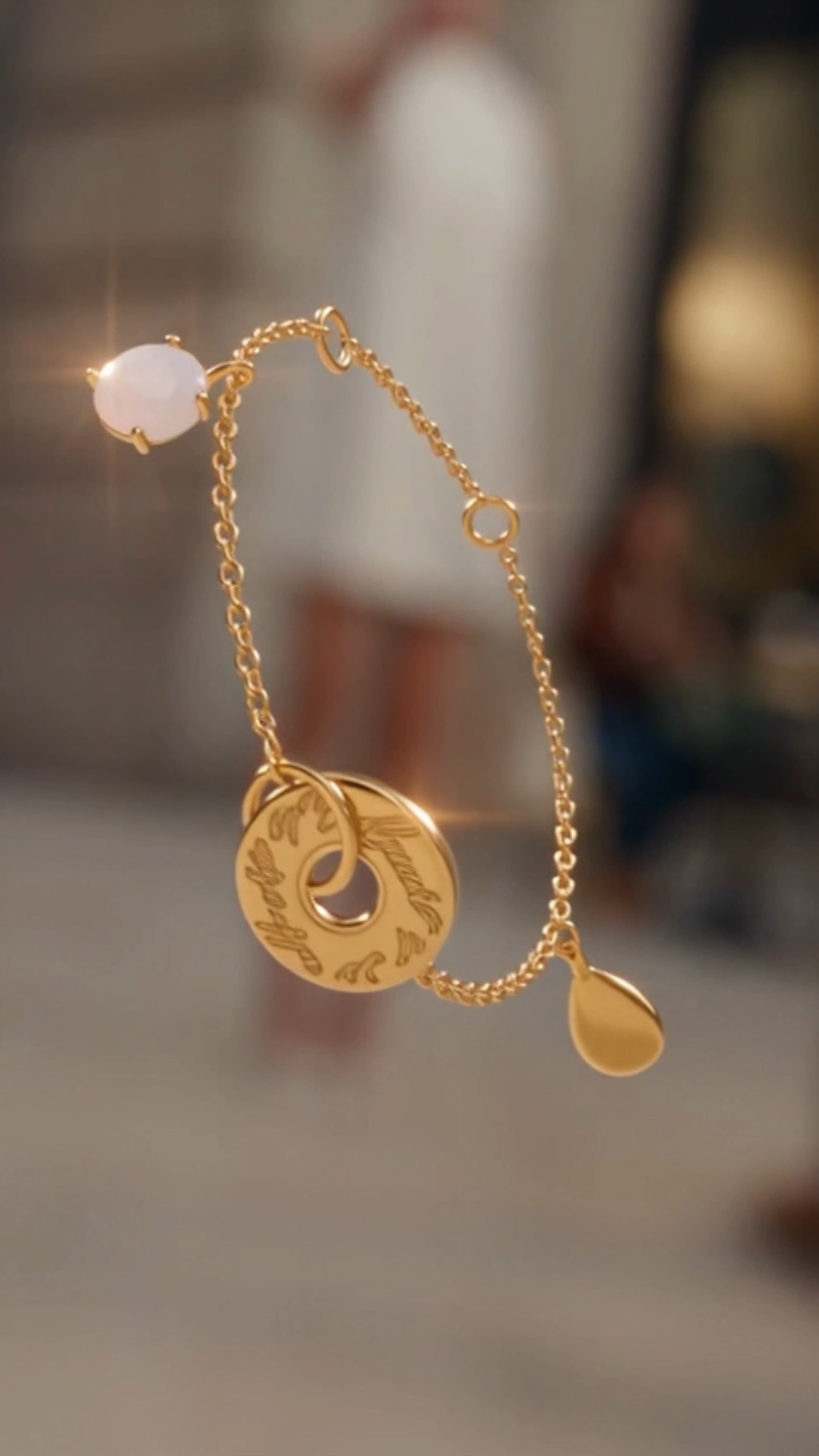 Natural moonstone gold-plated silver fine-chain bracelet with an engraved circular disc and polished teardrop charm