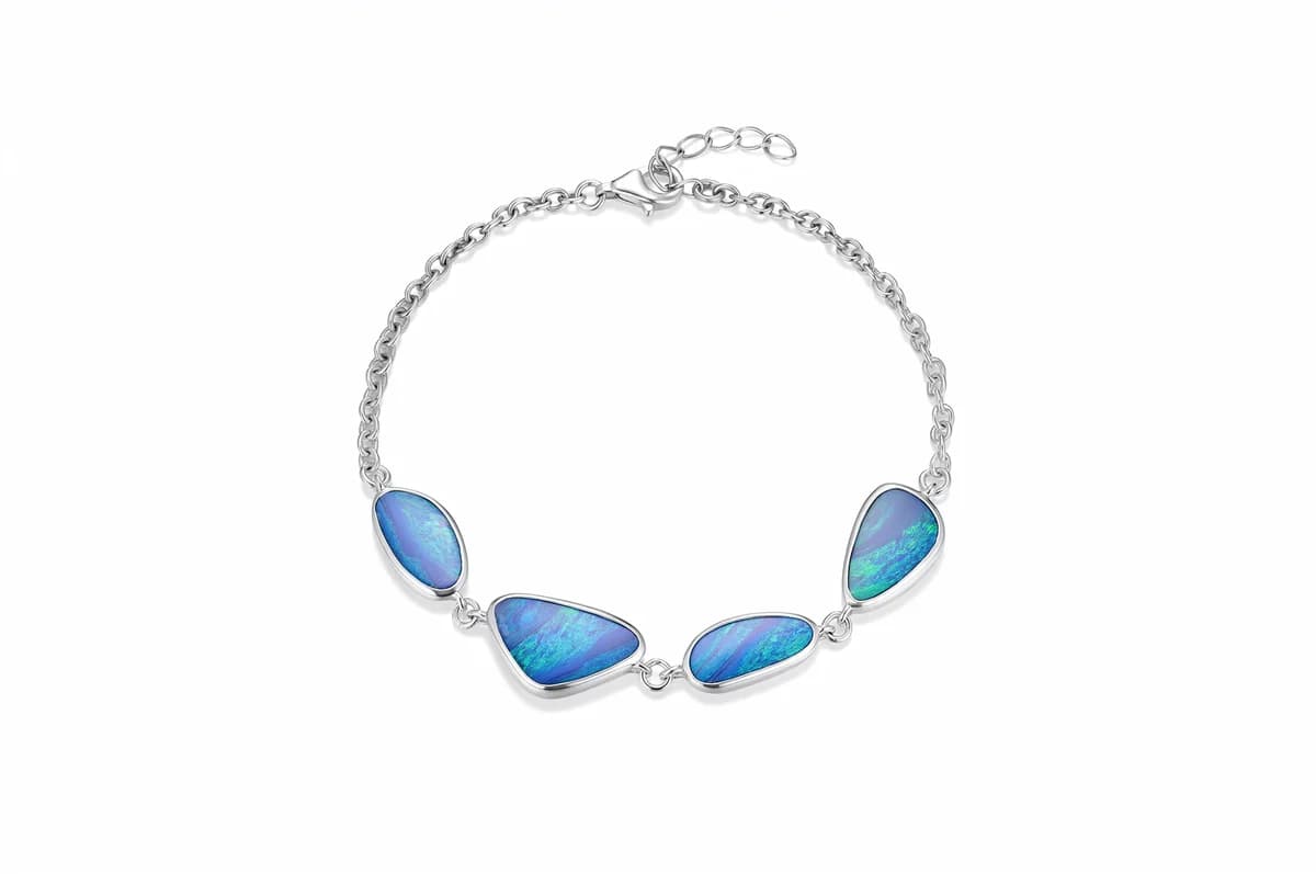 Four-Piece Iridescent Blue-Green Natural Opal Freeform Bezel-Set Adjustable Solid Sterling Silver Bracelet